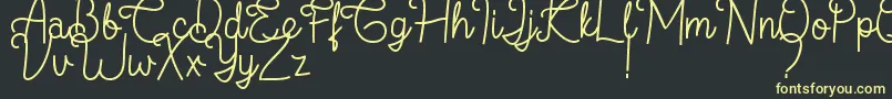 フォントFlamingo Regular – 黒い背景に黄色の文字