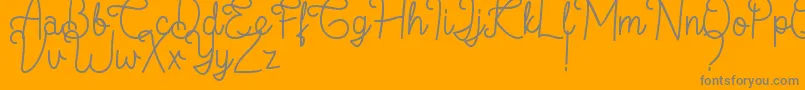 Flamingo Regular-Schriftart – Graue Schriften auf orangefarbenem Hintergrund