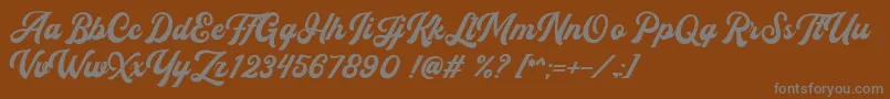 Flanders Script DEMO Font – Gray Fonts on Brown Background