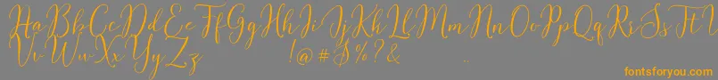 Flash Script Demo-Schriftart – Orangefarbene Schriften auf grauem Hintergrund