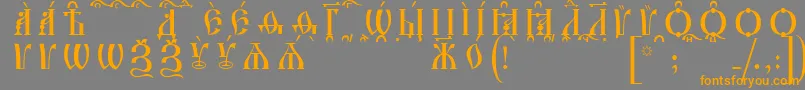 IrmologionCapsKucsSpacedout-fontti – oranssit fontit harmaalla taustalla
