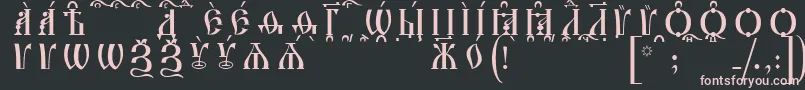 IrmologionCapsKucsSpacedout Font – Pink Fonts on Black Background
