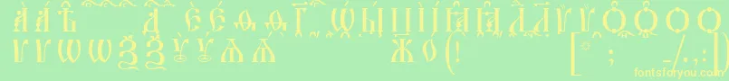 IrmologionCapsKucsSpacedout Font – Yellow Fonts on Green Background