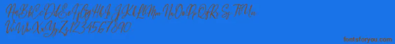 Fleur Bleue Font – Brown Fonts on Blue Background