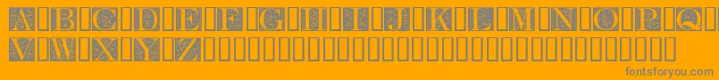 FleurCornerCaps-Schriftart – Graue Schriften auf orangefarbenem Hintergrund