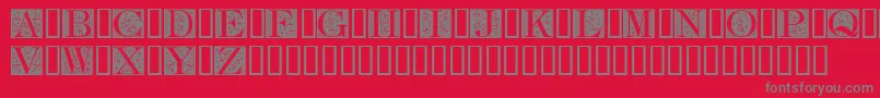 FleurCornerCaps Font – Gray Fonts on Red Background