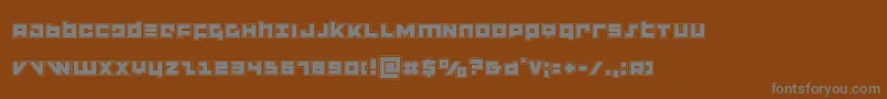 flightcorpsacad-fontti – harmaat kirjasimet ruskealla taustalla