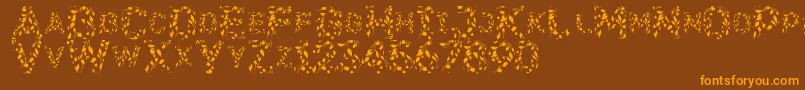 Flora SVG-Schriftart – Orangefarbene Schriften auf braunem Hintergrund