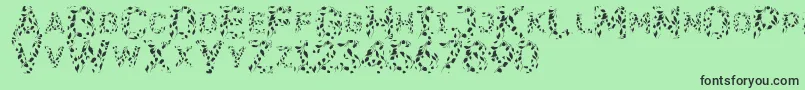 Fonte Flora SVG – fontes pretas em um fundo verde