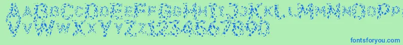 Więcej informacji o czcionce Flora Czcionka Flora – niebieskie czcionki na zielonym tle