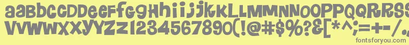 フォントFloraless – 黄色の背景に灰色の文字