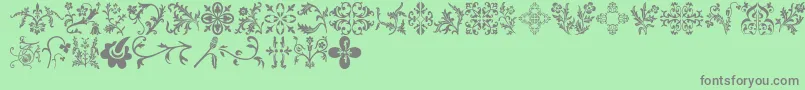 Saiba mais sobre a fonte Floralia Fonte Floralia – fontes cinzas em um fundo verde