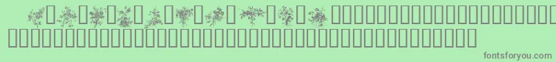 フォントFLORALS1 – 緑の背景に灰色の文字