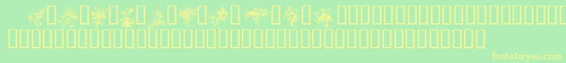 フォントFLORALS1 – 黄色の文字が緑の背景にあります