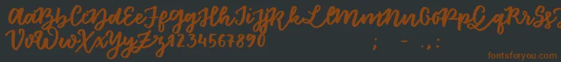 FloretSample-fontti – ruskeat fontit mustalla taustalla
