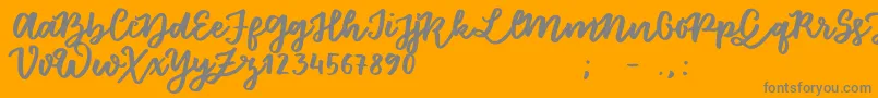 FloretSample-Schriftart – Graue Schriften auf orangefarbenem Hintergrund