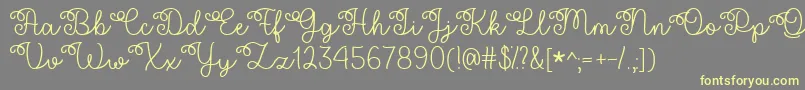 More about Flower Shop Font Flower Shop Font – Yellow Fonts on Gray Background