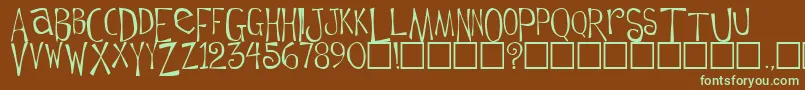 フォントFlowerchild Plain – 緑色の文字が茶色の背景にあります。