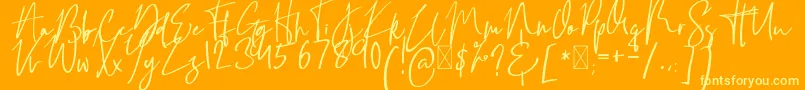 FlowerForRosallineFreeVersion Regular Font – Yellow Fonts on Orange Background