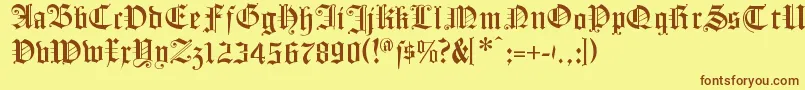 フォントFlyingHollander – 茶色の文字が黄色の背景にあります。