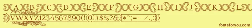 フォントFoglihtenFr02 – 茶色の文字が黄色の背景にあります。