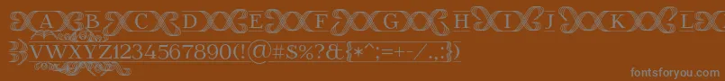 フォントFoglihtenFr02 – 茶色の背景に灰色の文字