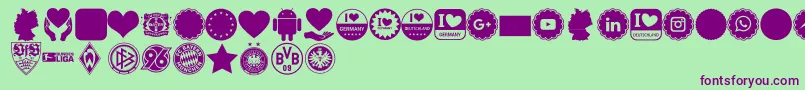 Font Color Germany-fontti – violetit fontit vihreällä taustalla