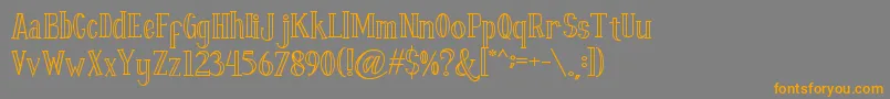 Fontastique Carved Font – Orange Fonts on Gray Background
