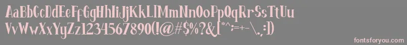 フォントFontastique – 灰色の背景にピンクのフォント