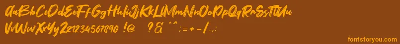 Fontbliz Free Font – Orange Fonts on Brown Background