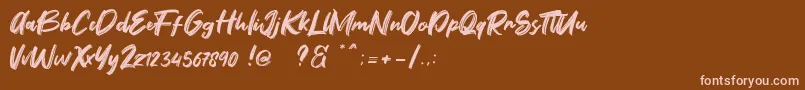 Fontbliz Free Font – Pink Fonts on Brown Background