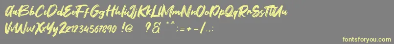 Fontbliz Free Font – Yellow Fonts on Gray Background
