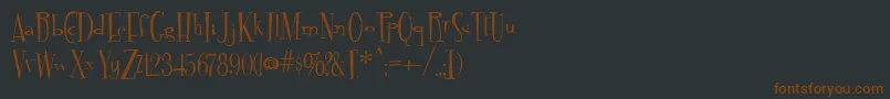 Fontdinerdotcom Font – Brown Fonts on Black Background