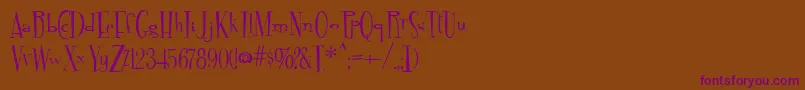 Fontdinerdotcom Font – Purple Fonts on Brown Background