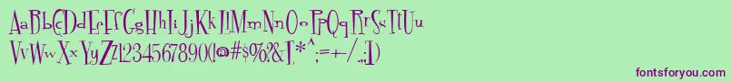 Fontdinerdotcom Font – Purple Fonts on Green Background