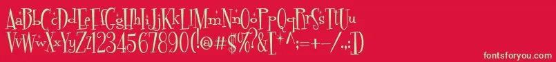 フォントFontdinerdotcomSparkly – 赤い背景に緑の文字