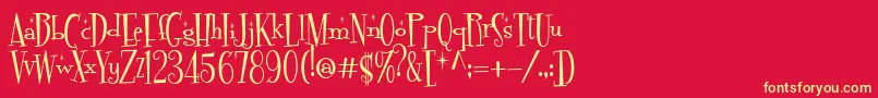 Fonte FontdinerdotcomSparkly – fontes amarelas em um fundo vermelho