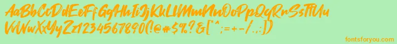 Fontjek Font – Orange Fonts on Green Background