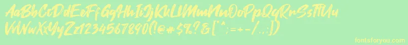 Fontjek Font – Yellow Fonts on Green Background