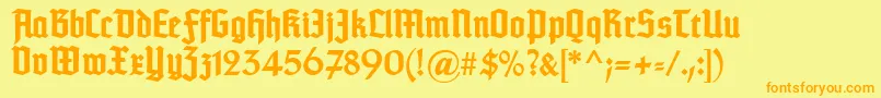 TypographertexturBold-fontti – oranssit fontit keltaisella taustalla