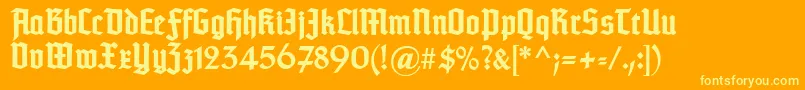Czcionka TypographertexturBold – żółte czcionki na pomarańczowym tle