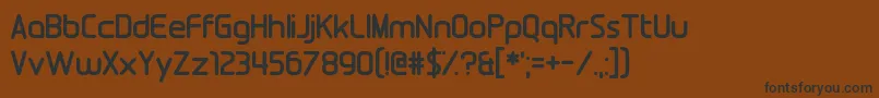 Fools Errand Font – Black Fonts on Brown Background