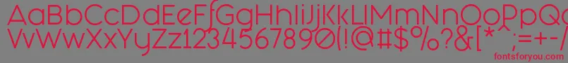 FashionFetishRegular Font – Red Fonts on Gray Background