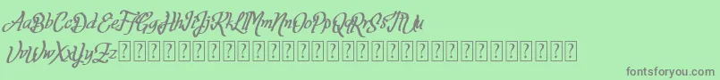 フォントFortuin FREE FOR PERSONAL USE – 緑の背景に灰色の文字