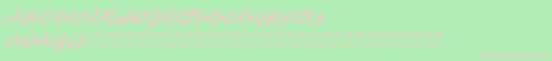 Fortuin FREE FOR PERSONAL USE-fontti – vaaleanpunaiset fontit vihreällä taustalla