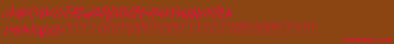 Fortuin FREE FOR PERSONAL USE Font – Red Fonts on Brown Background