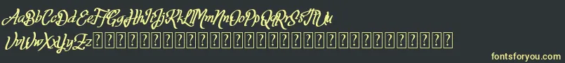 フォントFortuin FREE FOR PERSONAL USE – 黒い背景に黄色の文字