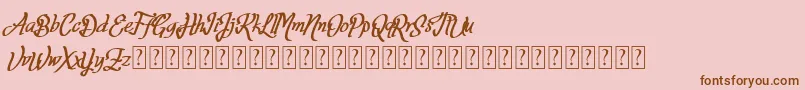 Fortuin FREE FOR PERSONAL USE-Schriftart – Braune Schriften auf rosa Hintergrund