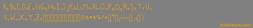 フォントFoxedInn Regular – オレンジの文字は灰色の背景にあります。