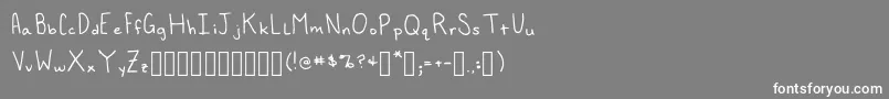 FoxedInn Regular Font – White Fonts on Gray Background